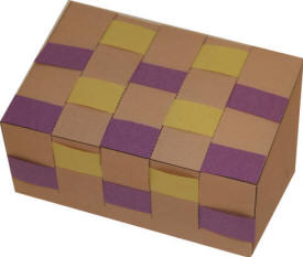 Manualidad de papel canasta tejida