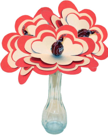 Manualidad de papel flor con piruleta